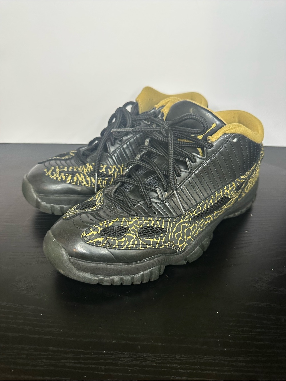 Jordan 11 Retro Low IE Black Metallic Gold (Women's) - 316318-071 Size 7.5